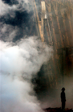 A solitary firefighter at Ground Zero on  9/11.