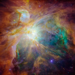Hubble and Spitzer Space Telescopes image of the Orion Nebula.
