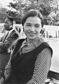 Rosa Lee Parks in 1955 with MLK in the background.
