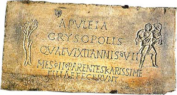 An inscription dedicated by parents of a deceased 7 year old girl, Apuleia Crysopolis, with Good Shepherd, Catacomb of St. Callisto, Rome.