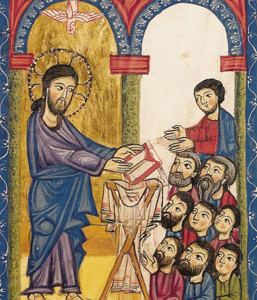 Jesus reading a scroll.