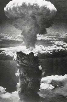 A mushroom cloud rises 7,000 meters above Nagasaki in Japan on 9th August 1945.