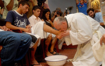 Pope Francis foot washing.