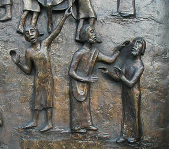 Detail of ceremonial bronze door, St. James Cathedral, Seattle, by Ulrich Henn.