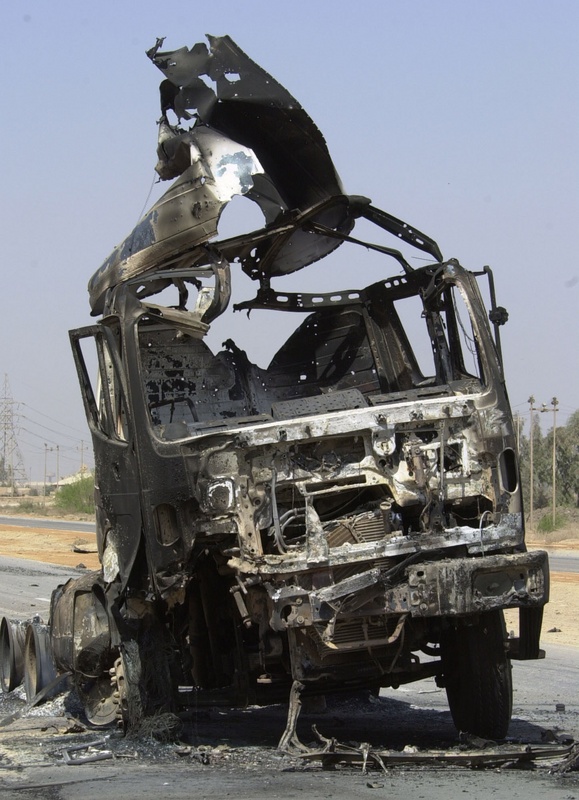 Photo of bombed-out truck in Iraq