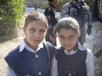 Young Iraqi school girls in uniform able to safely attend primary school.
