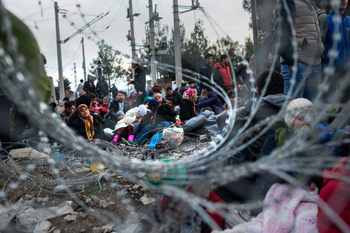 Refugees at the Greek-Macedonian border.  Photo by Robert Atanasovski.